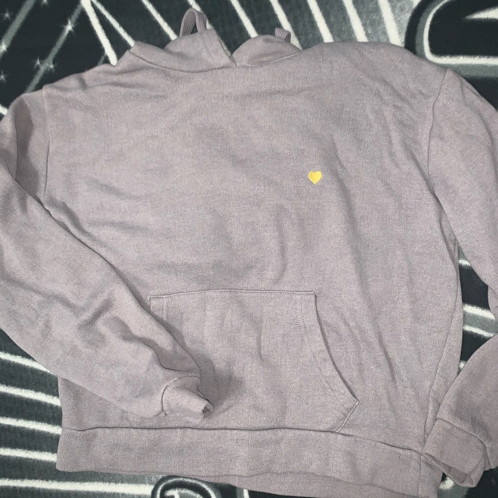grey hoodie with yellow heart